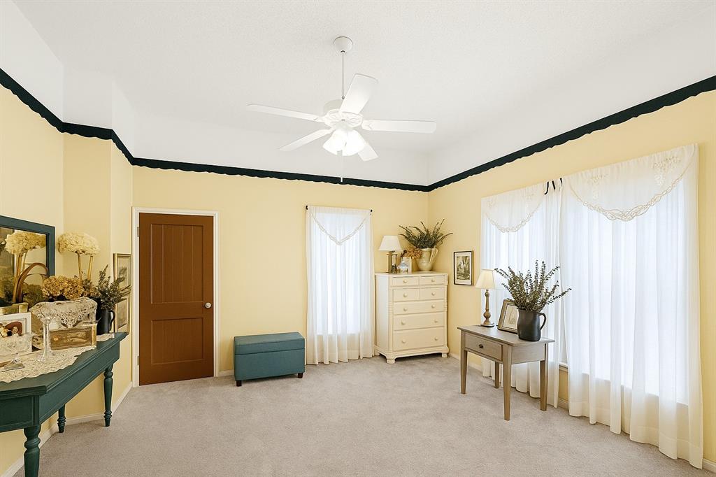 314 Cockerell Street Eustace, TX 75124 - Photo 7 of 15 a living room with furniture and a chandelier