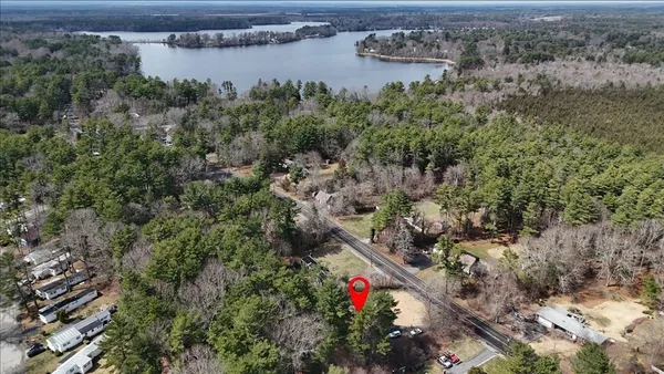 an aerial view of a houses with outdoor space