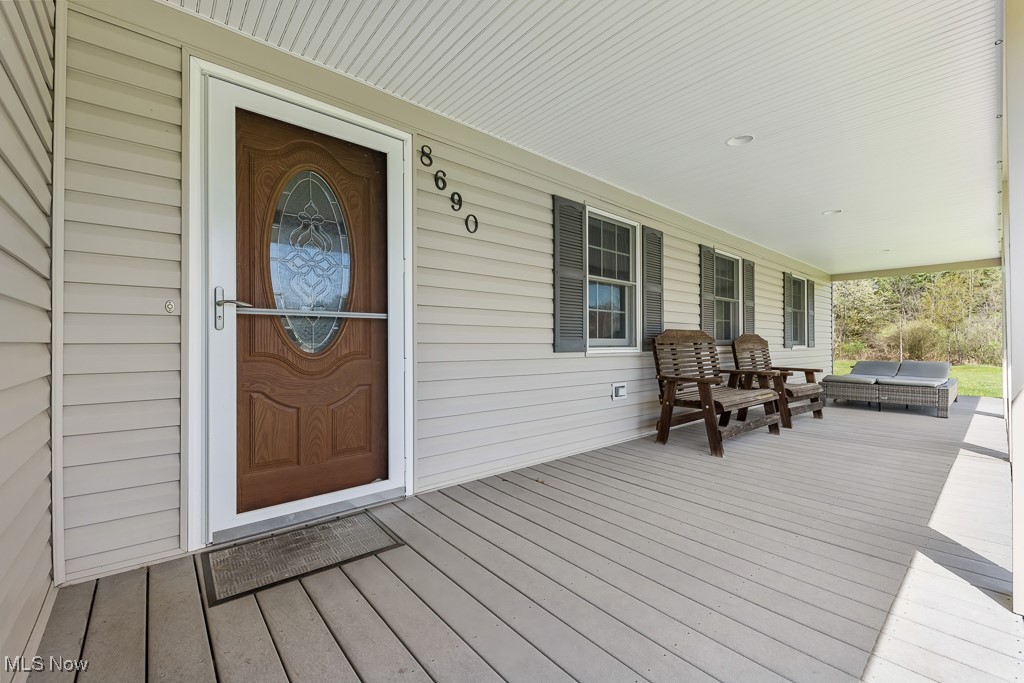 8690 Friendsville Road Lodi, OH 44254 - Photo 3 of 50 Wooden deck with a porch