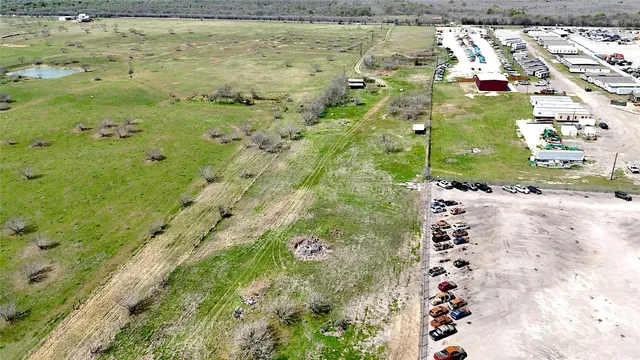 a view of residential houses with outdoor space
