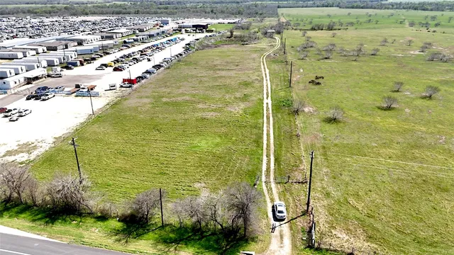 a view of a yard with an outdoor space