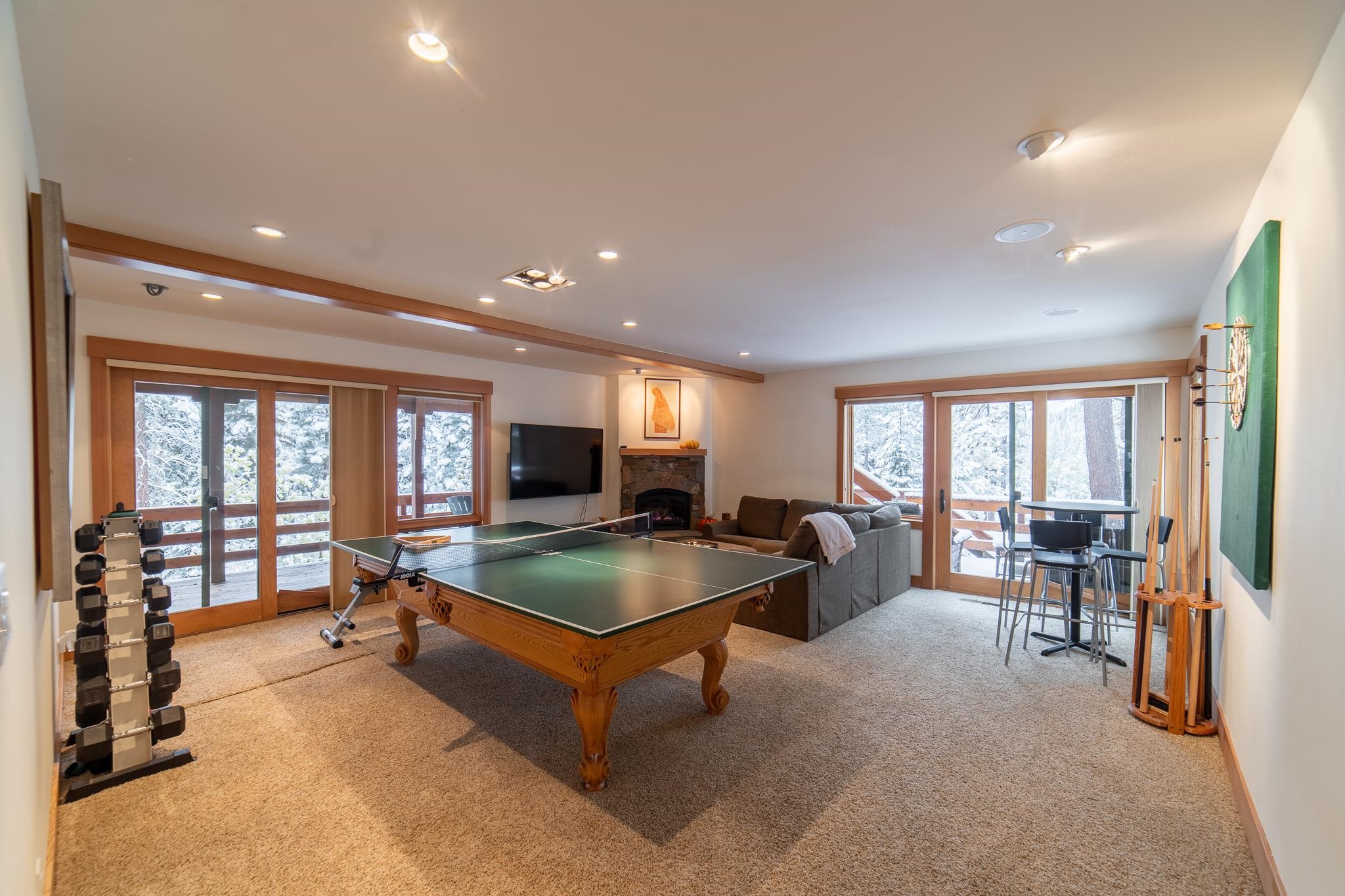 406 Lodgepole Truckee, CA 96161 - Photo 15 of 21 a living room with furniture and large windows