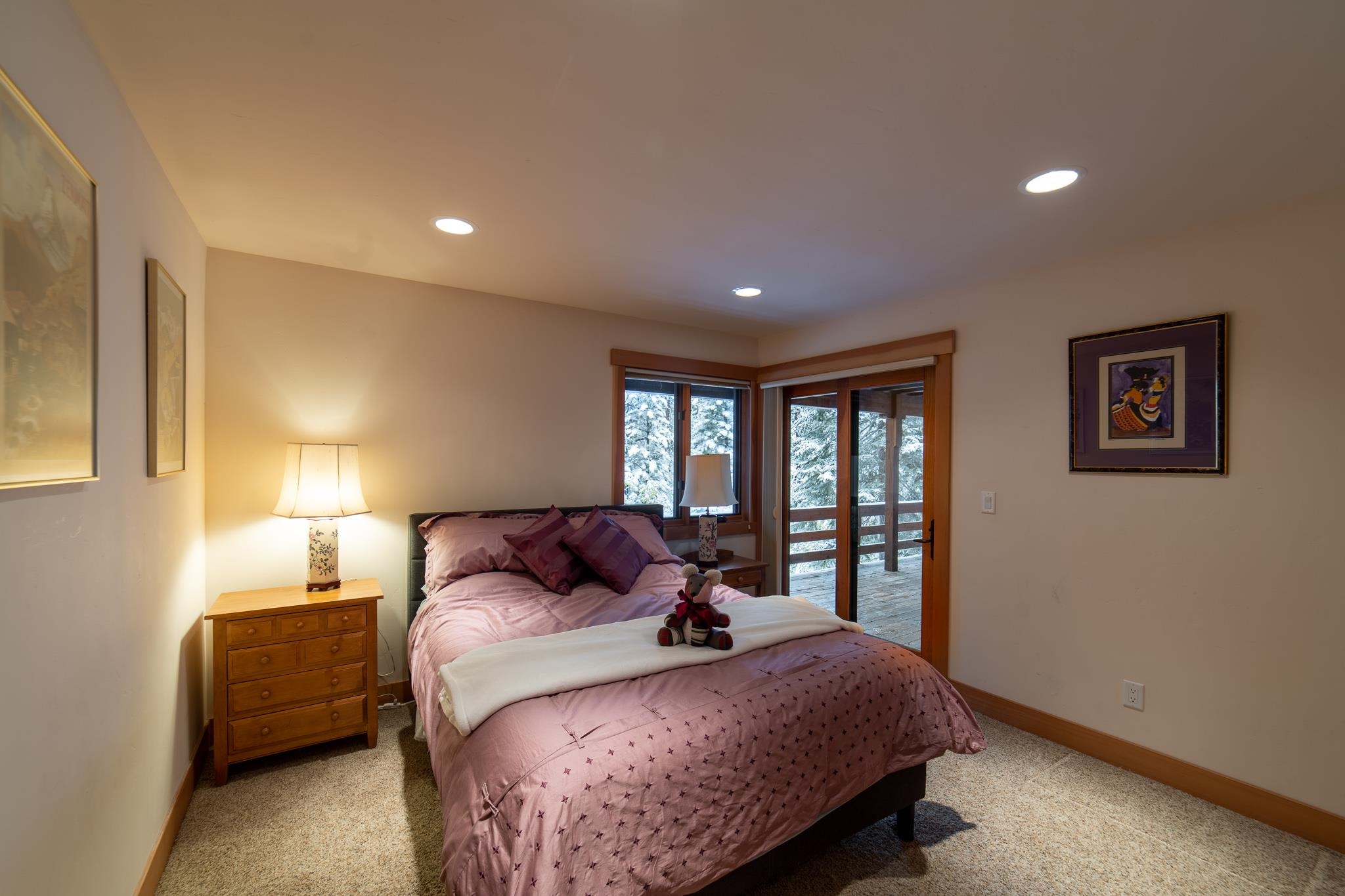 406 Lodgepole Truckee, CA 96161 - Photo 16 of 21 a bedroom with a large bed and a large window