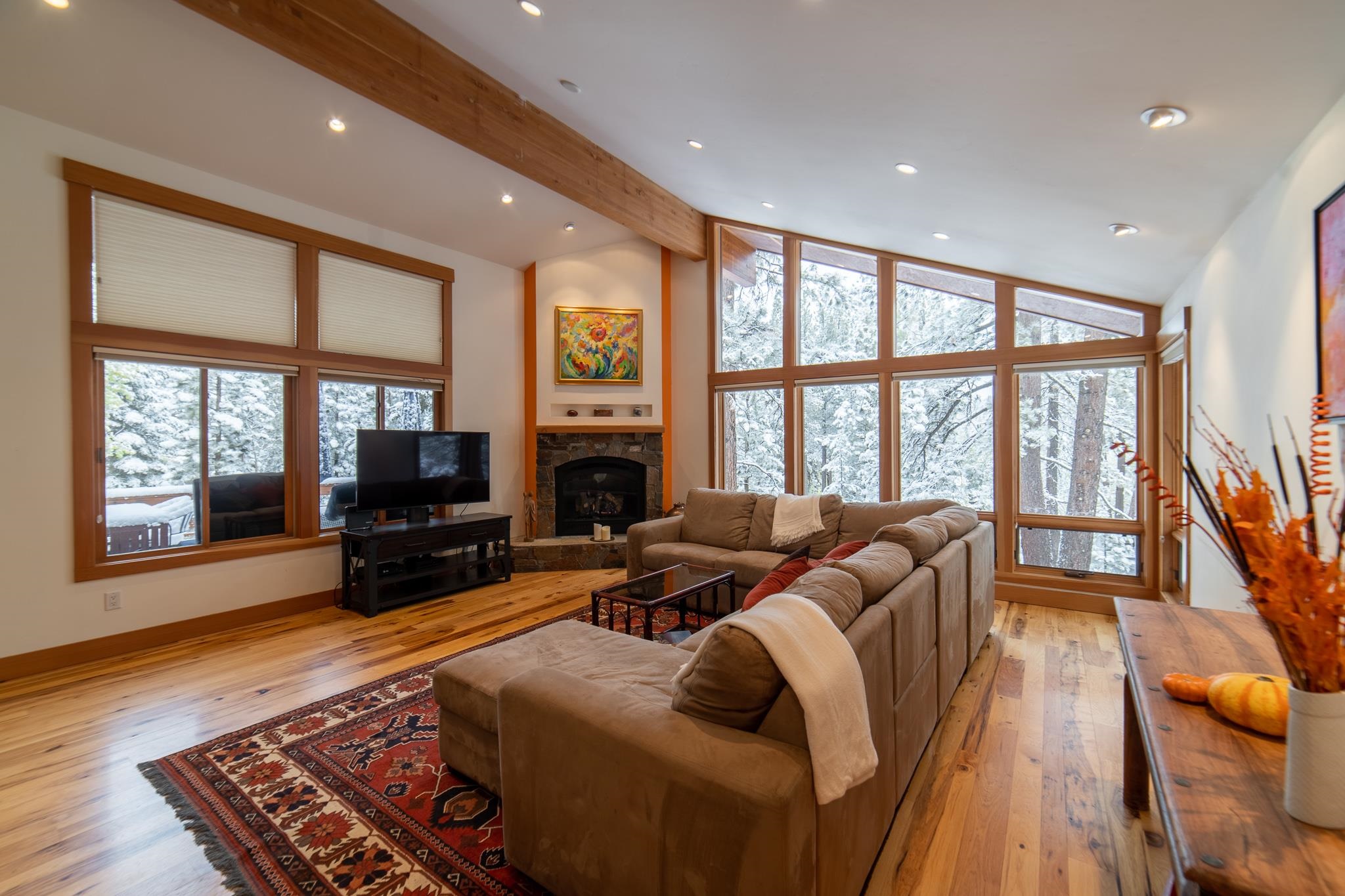 406 Lodgepole Truckee, CA 96161 - Photo 3 of 21 a living room with furniture large windows and a flat screen tv