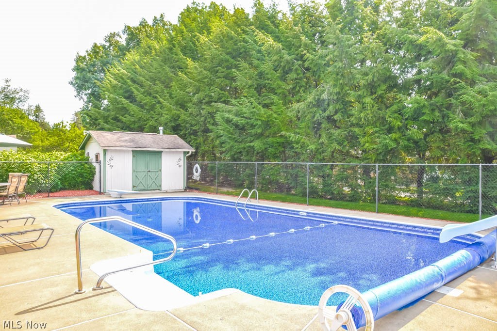 306 Everhard Road Southwest North Canton, OH 44709 - Photo 30 of 35 20x40 fenced pool! 9-feet deep, new heater and liner plus a poolhouse!