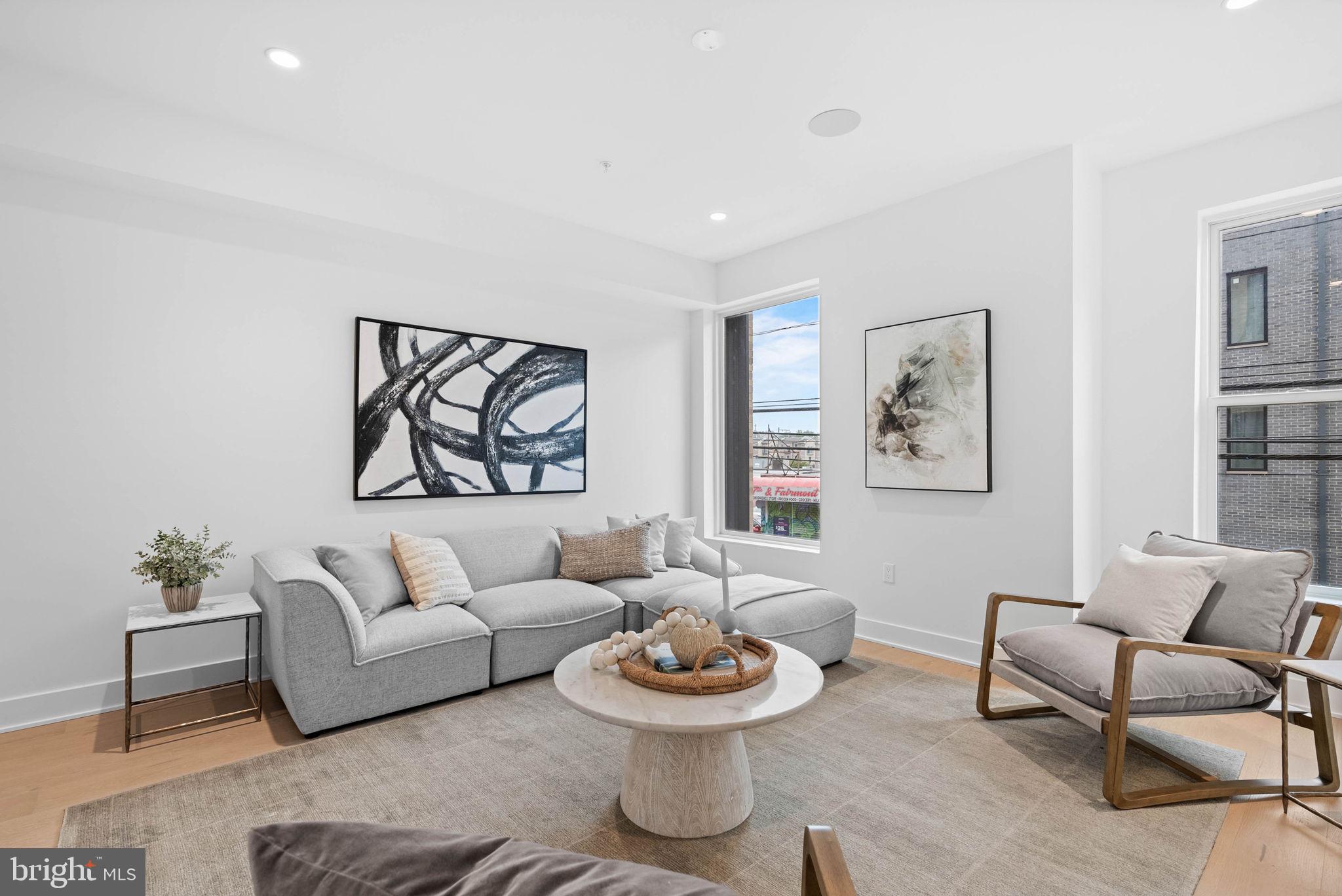 650 Fairmount Avenue, Unit I3 Philadelphia, PA 19123 - Photo 13 of 42 a living room with furniture and a table