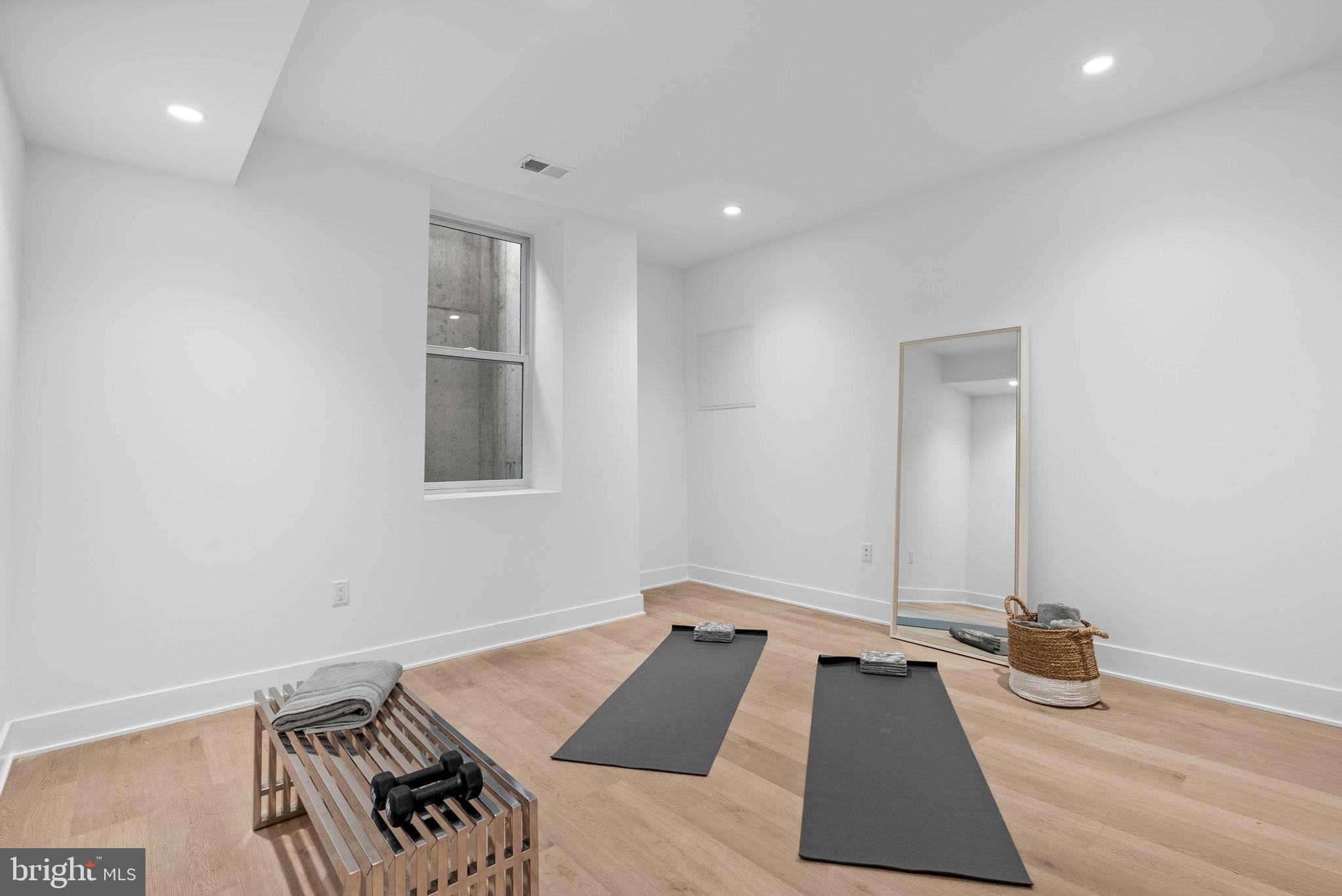 650 Fairmount Avenue, Unit I3 Philadelphia, PA 19123 - Photo 33 of 42 a view of a room with gym equipment