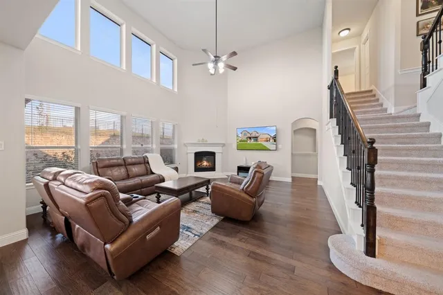 a bathroom with a tub shower and sink