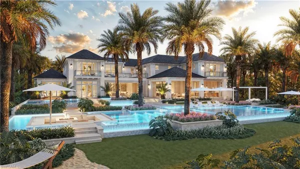 a view of a house with swimming pool and a garden