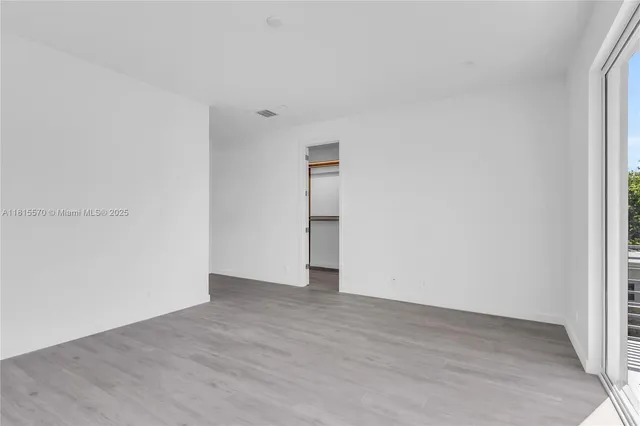 a view of an empty walk in closet