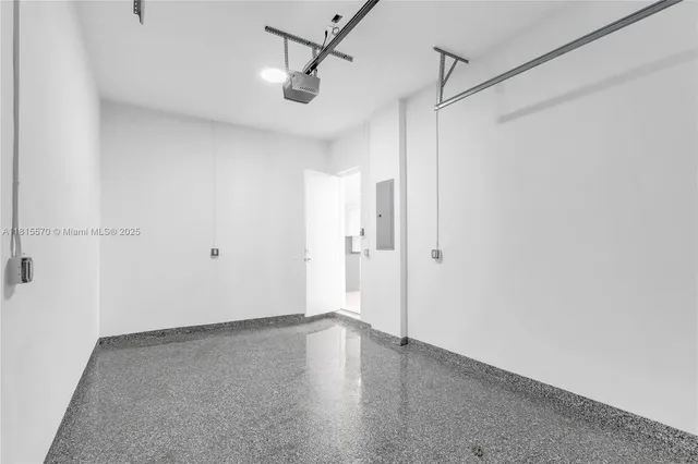 a bathroom with a sink a washer and dryer