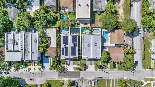 an aerial view of multiple house