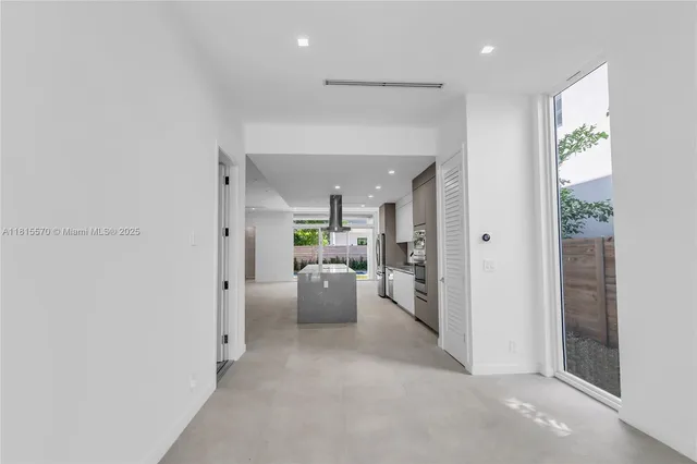 a view of a living room and dining room