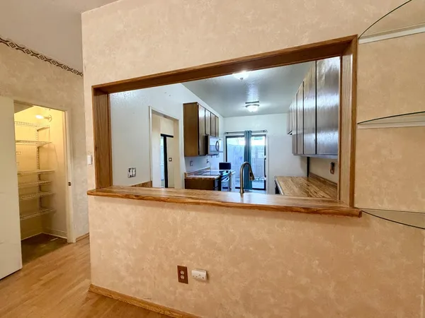 view of hall way with mirror