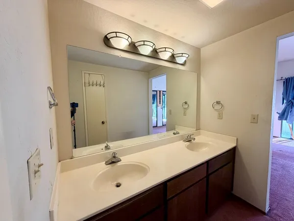 a bathroom with a bathtub and a toilet