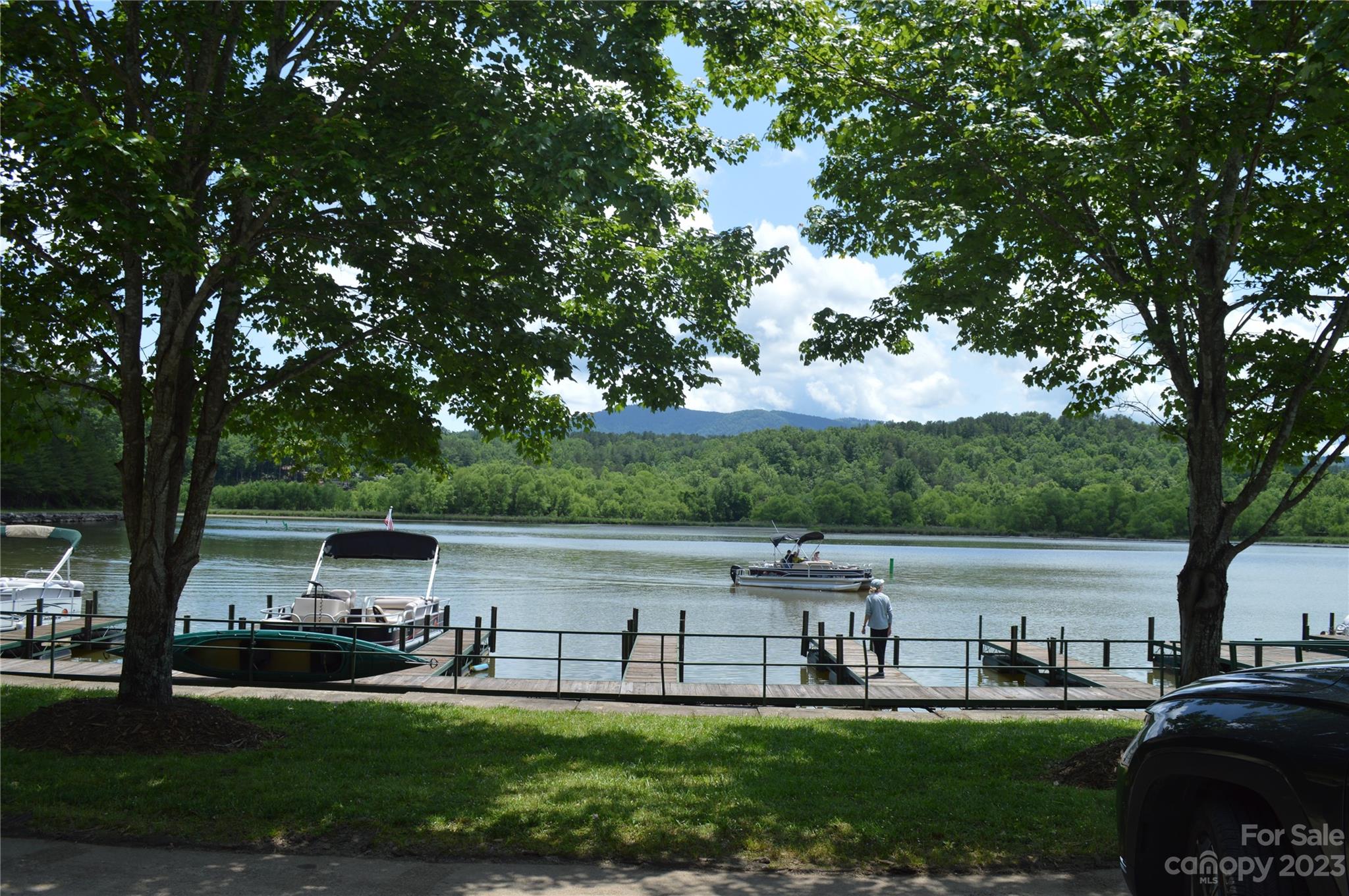 35 Parkway North None Mill Spring, Unit NONE Mill Spring, NC 28756 - Photo 11 of 17 a view of a lake with houses