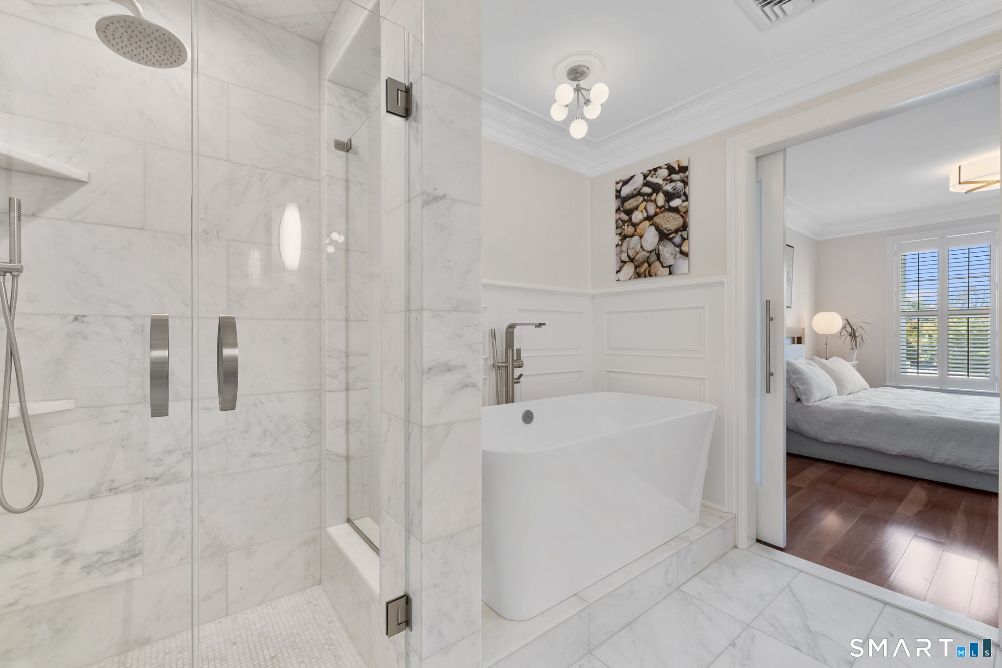 85 Memorial Road, Unit 205 West Hartford, CT 06107 - Photo 22 of 40 a bathroom with a bathtub and a shower