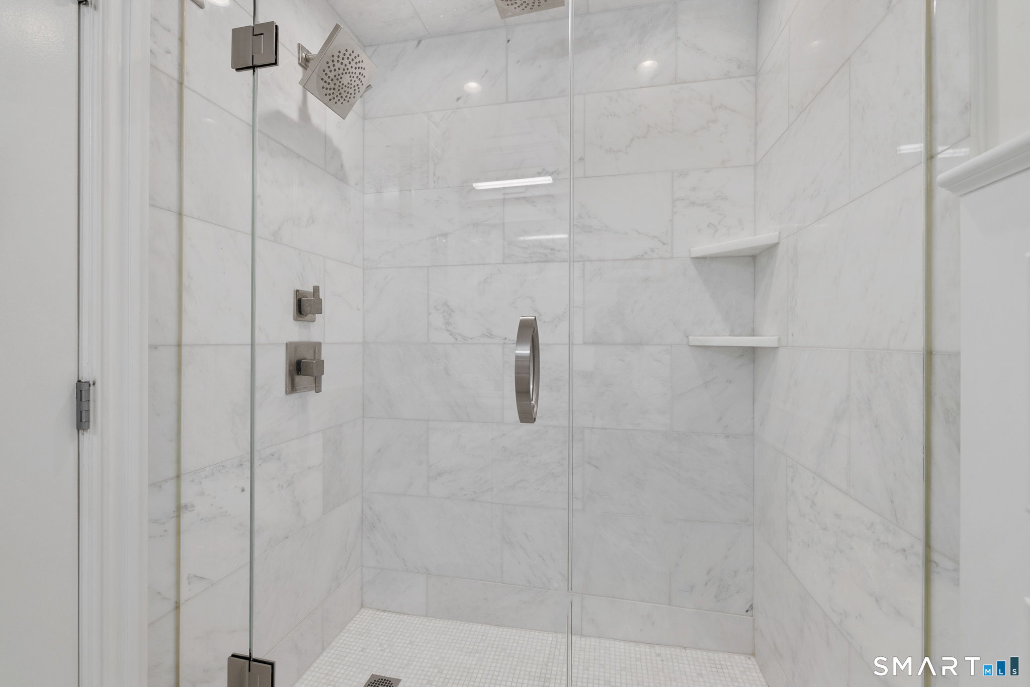 85 Memorial Road, Unit 205 West Hartford, CT 06107 - Photo 28 of 40 a bathroom with a shower