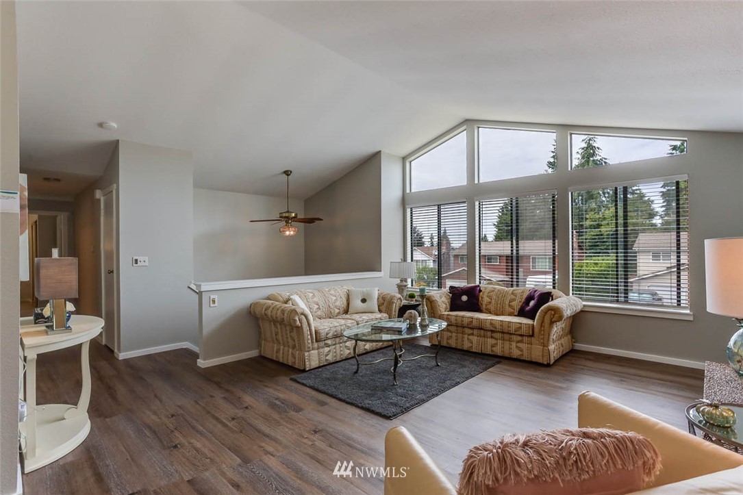 2805 Northeast 23rd Place Renton, WA 98056 - Photo 3 of 27 a living room with furniture and a large window