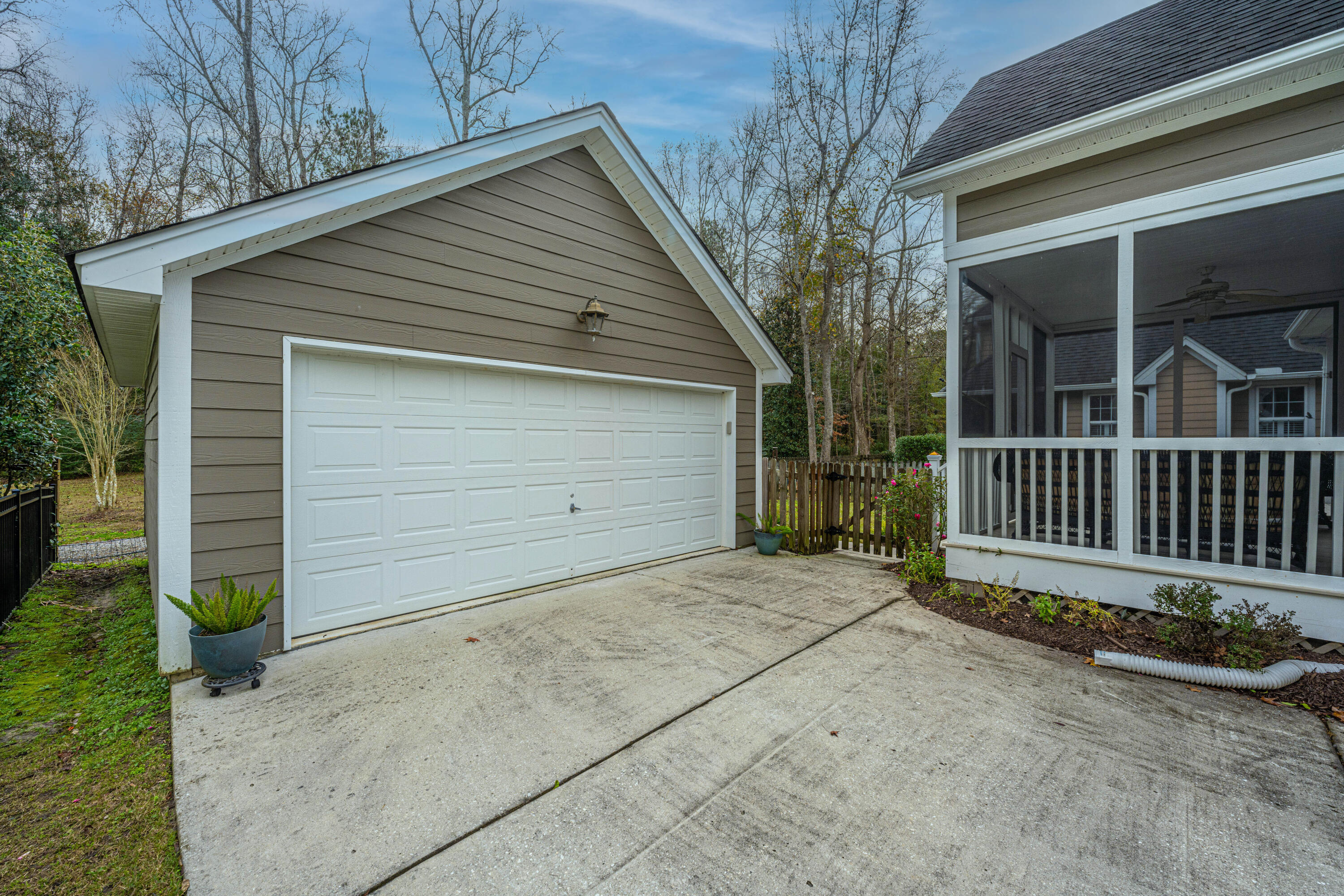 671 Fair Spring Drive Charleston, SC 29414 - Photo 6 of 46 Garage Side