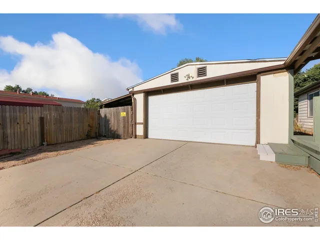a view of backyard of garage