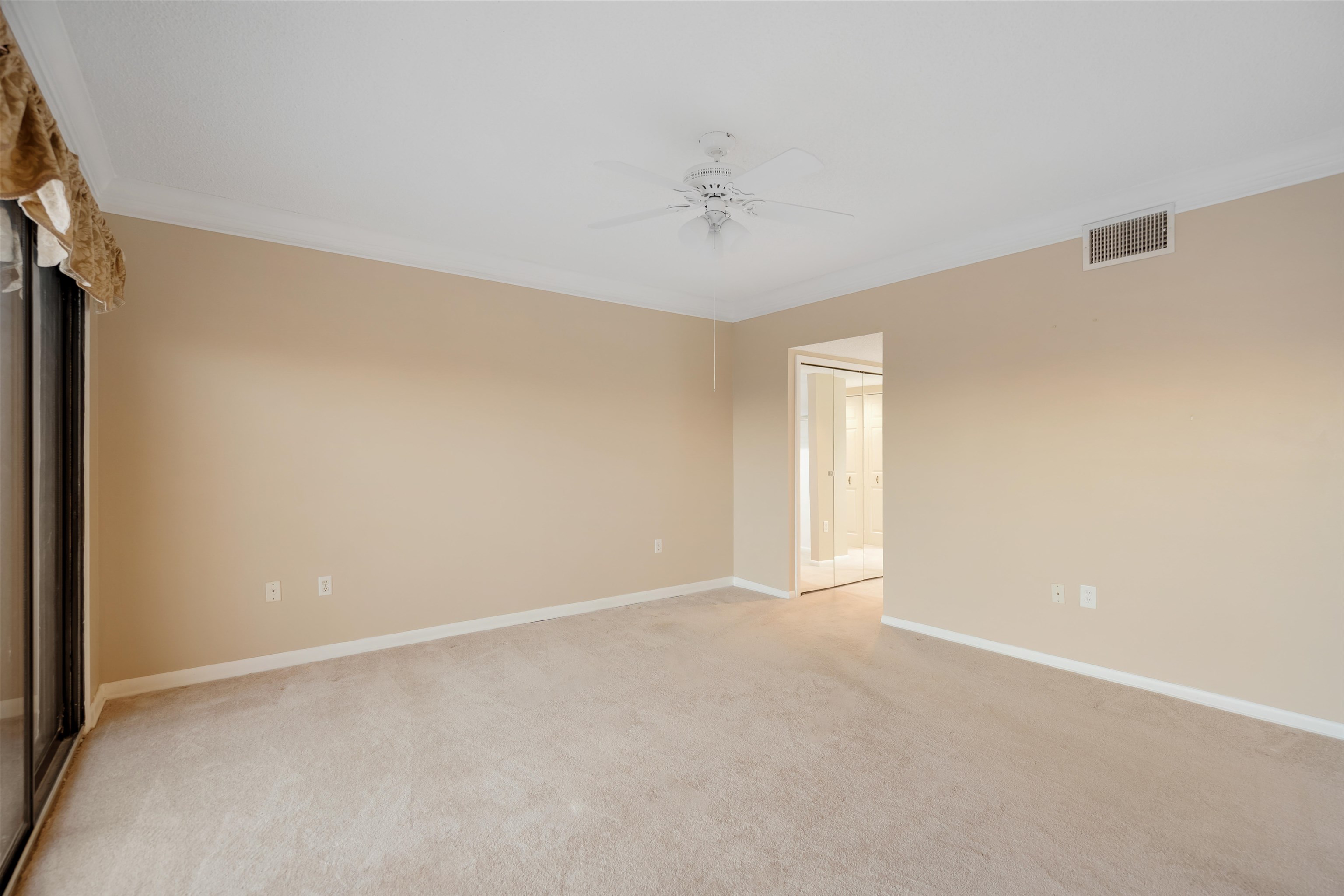 20 Dondanville Road, Unit A302 St. Augustine, FL 32080 - Photo 18 of 43 a view of an empty room with a window