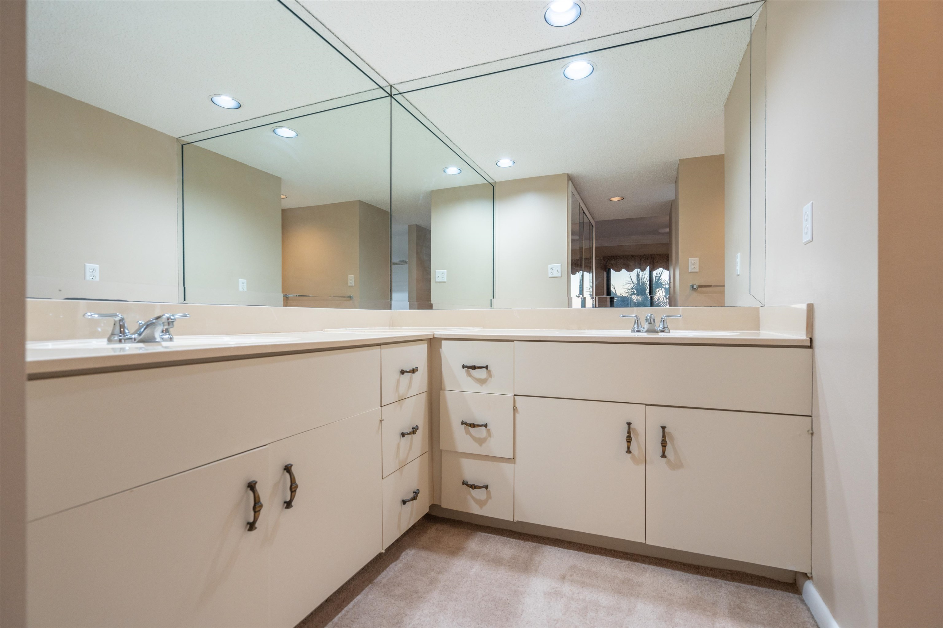 20 Dondanville Road, Unit A302 St. Augustine, FL 32080 - Photo 20 of 43 a bathroom with a sink vanity and mirror