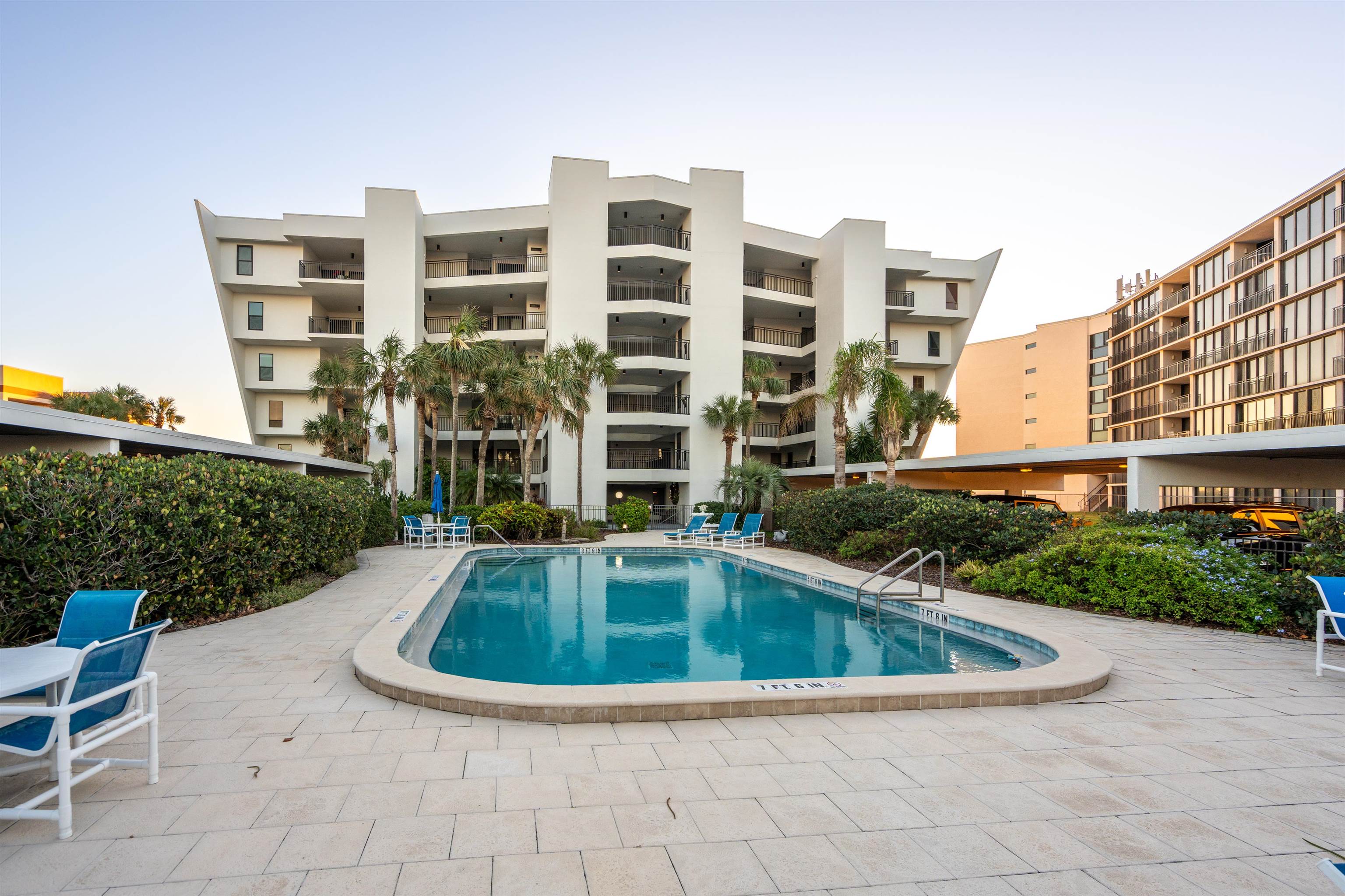 20 Dondanville Road, Unit A302 St. Augustine, FL 32080 - Photo 42 of 43 a view of a swimming pool with a yard