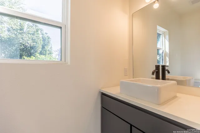 a view of balcony with wooden floor