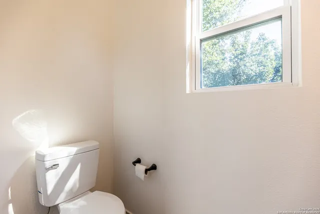 a view of a balcony with wooden floor