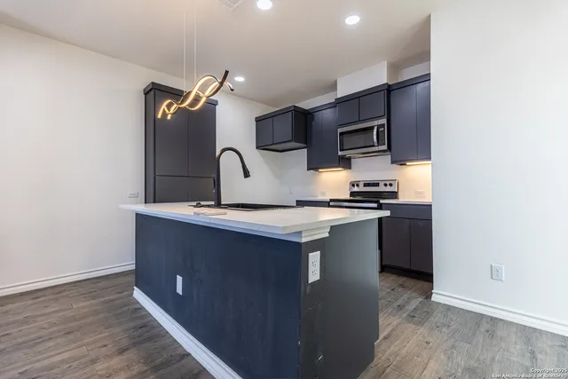 a room with wooden cabinets