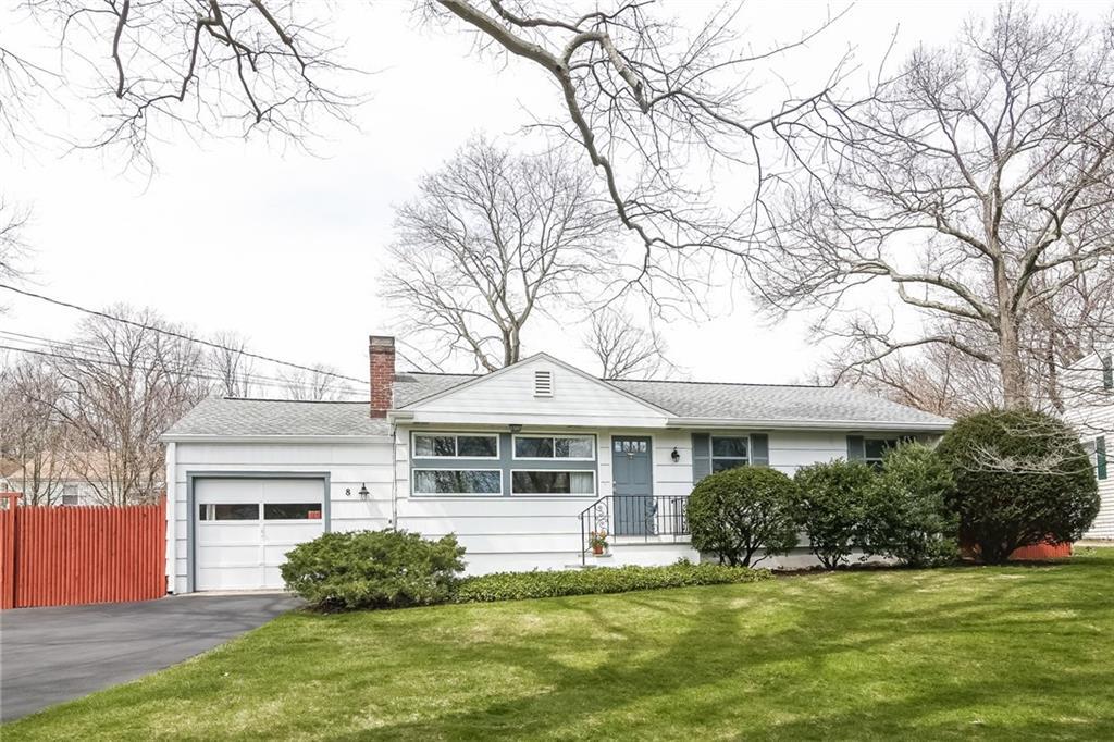 8 Powder Horn Road Norwalk, CT 06850 - Photo 1 of 1 a front view of a house with a garden