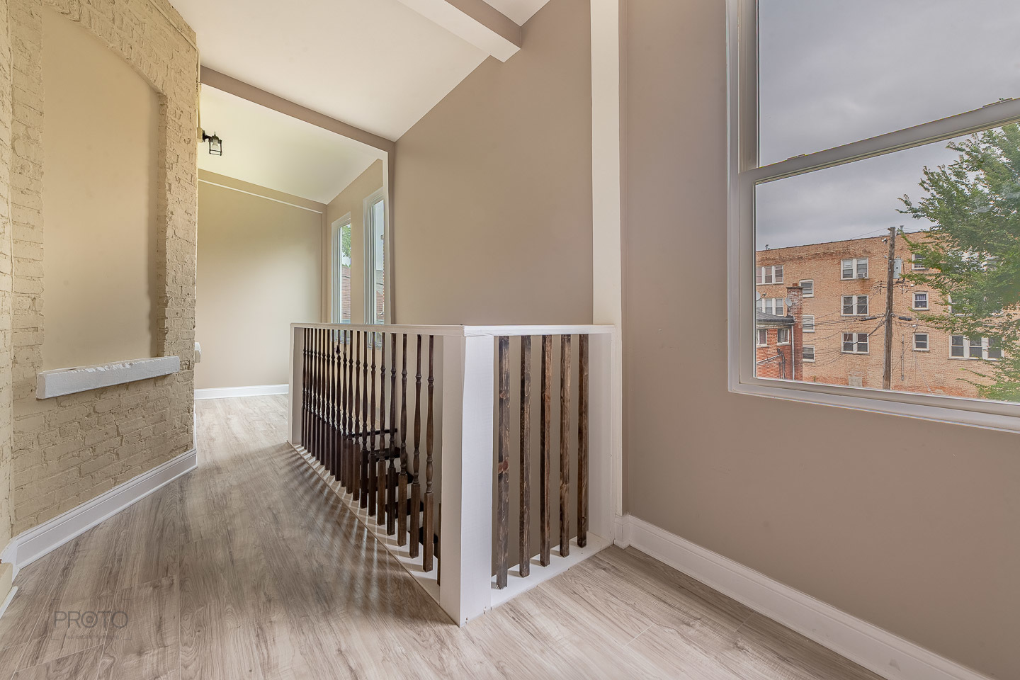 35 North Mayfield Avenue, Unit 2 Chicago, IL 60644 - Photo 14 of 15 a view of hallway with wooden floor