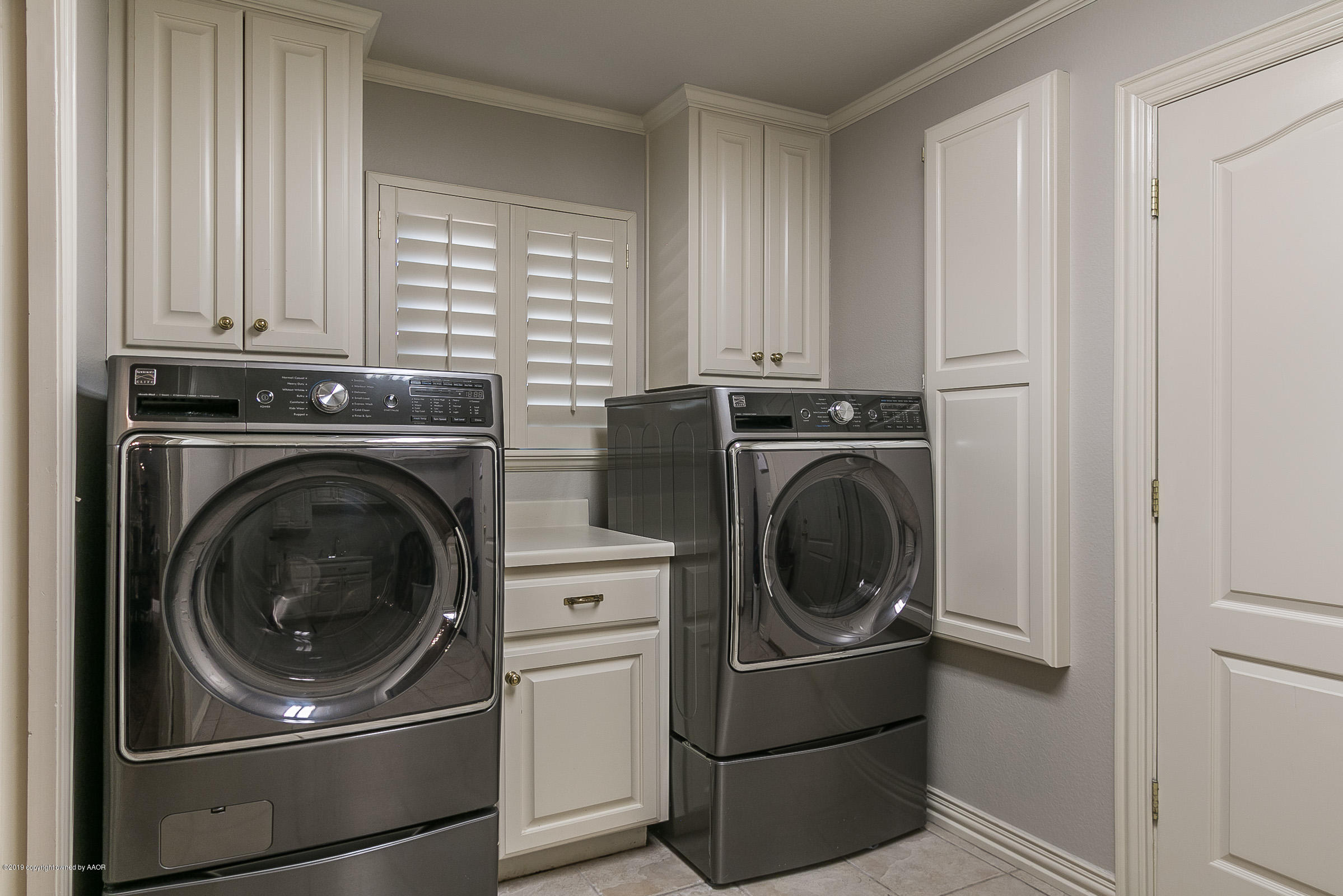 7607 Bayswater Road Amarillo, TX 79119 - Photo 27 of 31 027_Utility Room