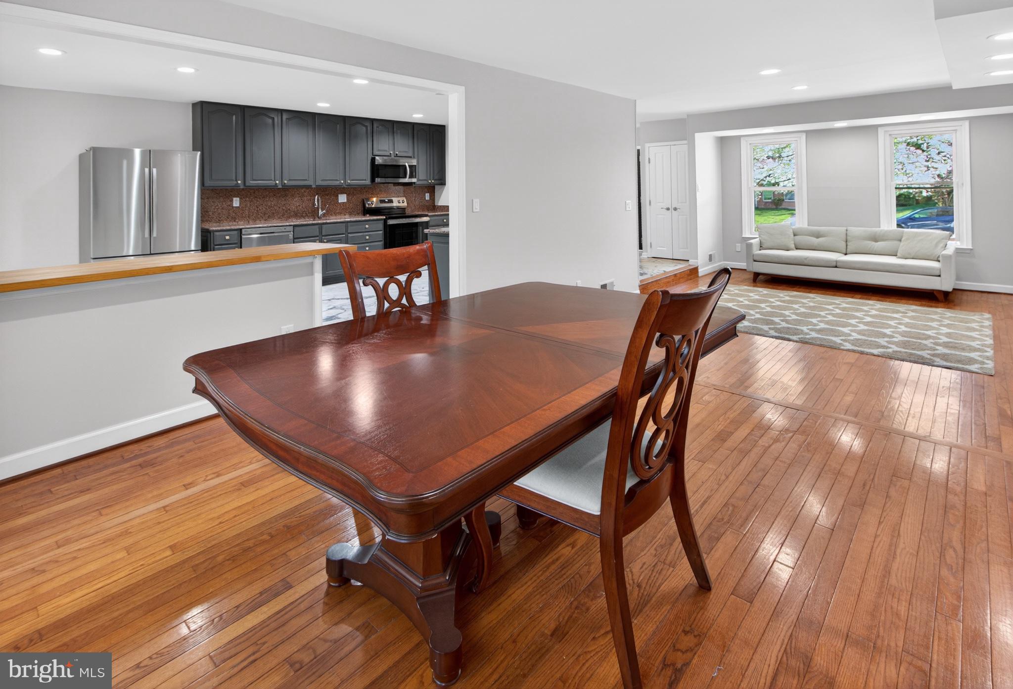 16 Redding Ridge Drive Gaithersburg, MD 20878 - Photo 47 of 53 Elegant dining space with warm tones.