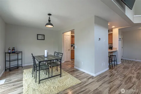 a view of a dining room with furniture