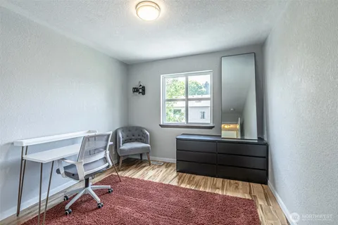 a room with furniture and a window