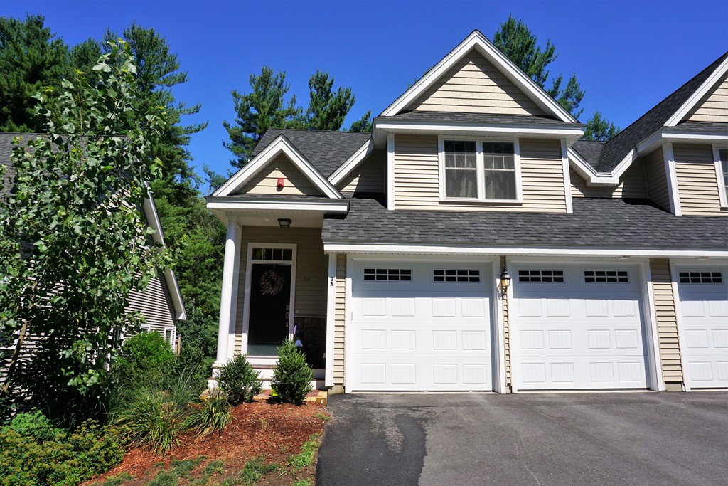 3 Trail Ridge Way, Unit 3A Harvard, MA 01451 - Photo 1 of 19 a front view of a house with garden
