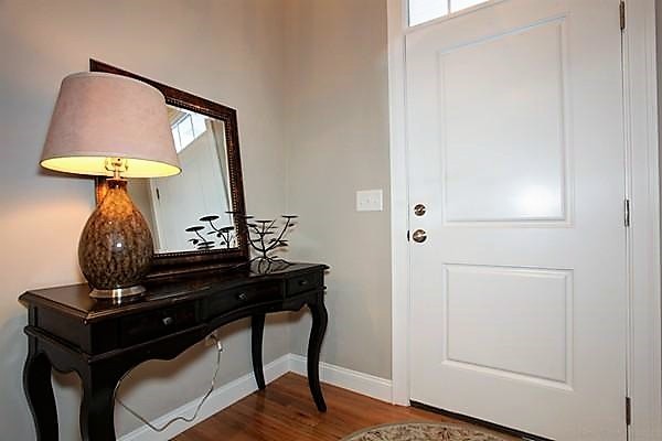 3 Trail Ridge Way, Unit 3A Harvard, MA 01451 - Photo 3 of 19 a view of hallway with a table and a mirror