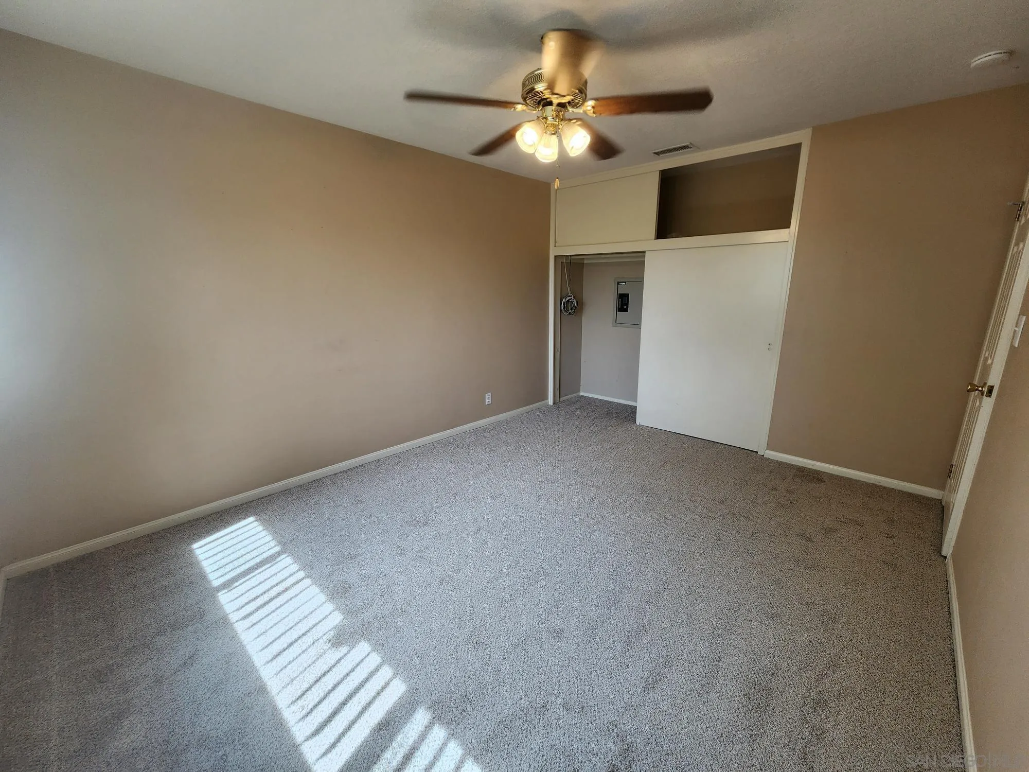 1972 Buena Creek Road Vista, CA 92084 - Photo 16 of 22 a view of an empty room with a window