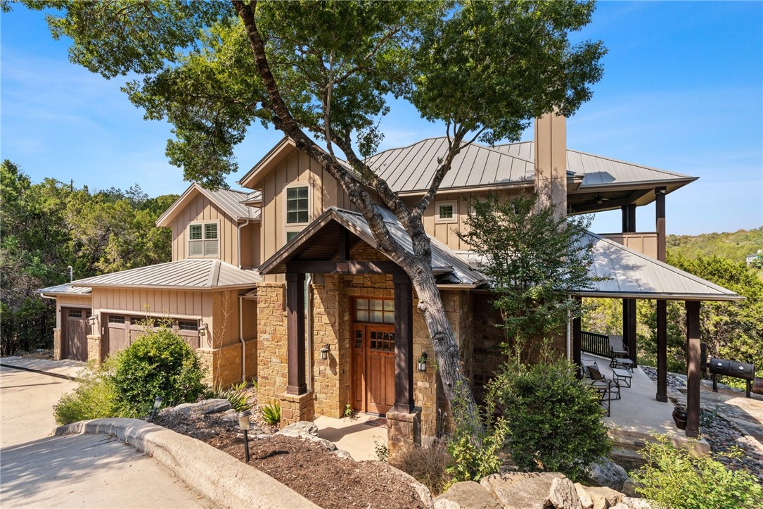 2404 Crazyhorse Pass Austin, TX 78734 - Photo 1 of 1 a front view of a house with a yard