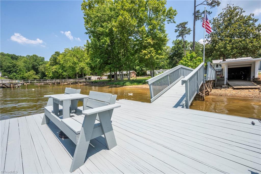 2113 Warf Road Lexington, NC 27292 - Photo 17 of 50 Sitting area with 2 adirondack chairs that remain