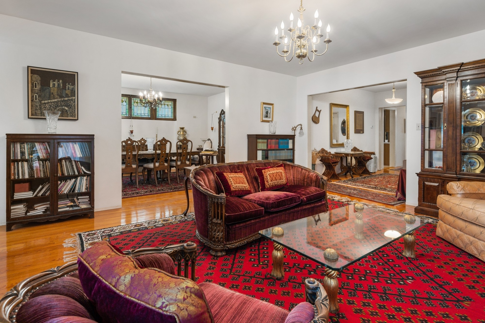 731 West Junior Terrace Chicago, IL 60613 - Photo 11 of 30 a living room with furniture or couch and a bookshelf