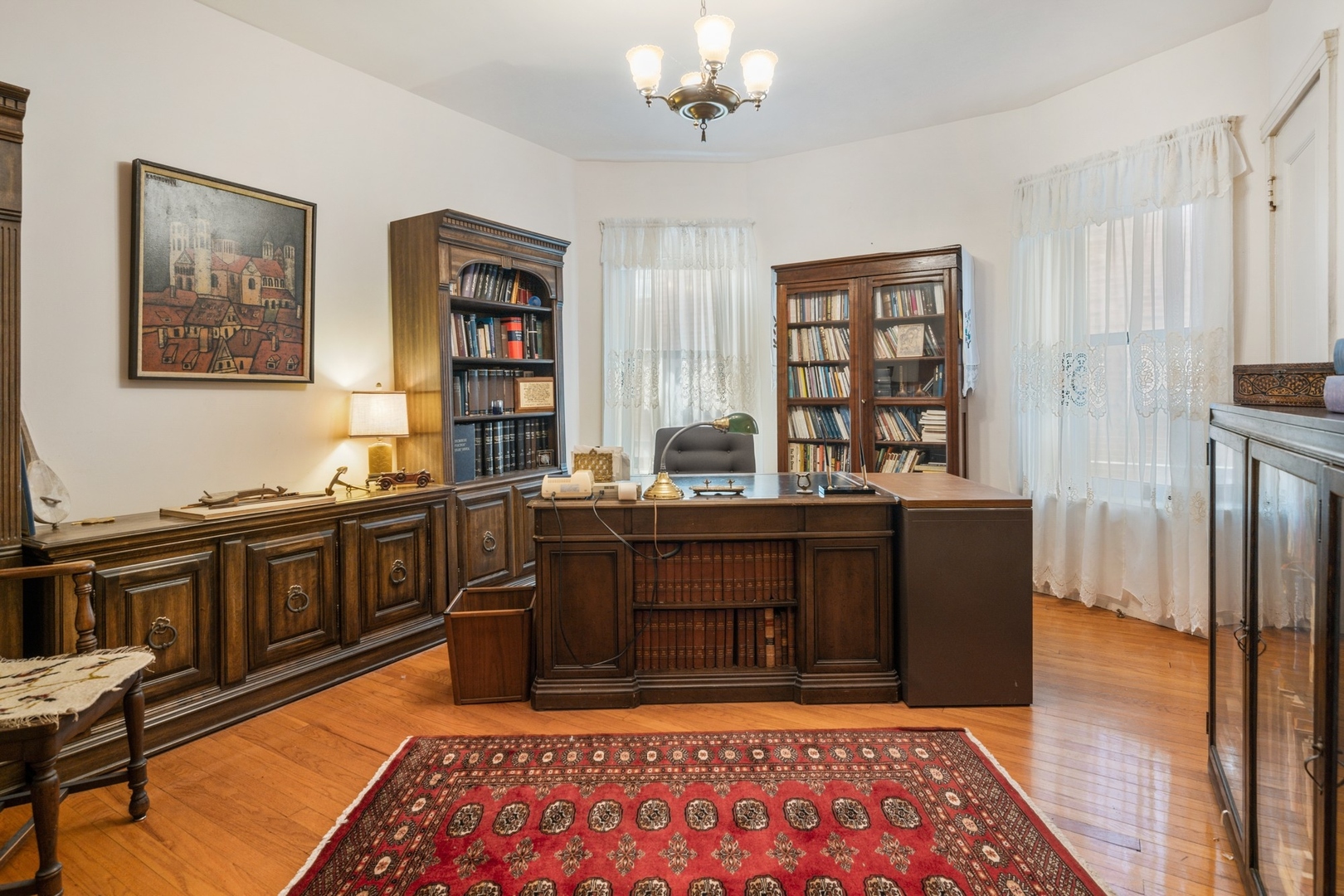 731 West Junior Terrace Chicago, IL 60613 - Photo 16 of 30 a living room with stainless steel appliances granite countertop furniture rug and wooden floor