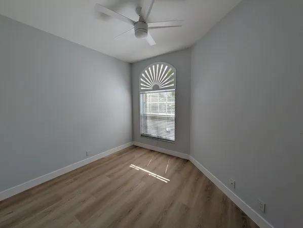 a bathroom with a sink and shower