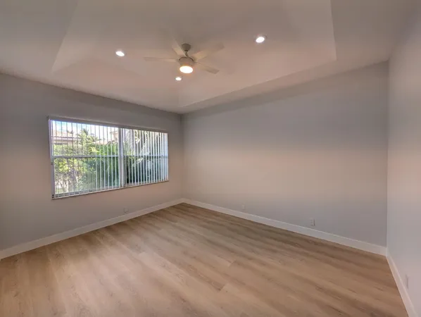 a view of a livingroom with wooden floor