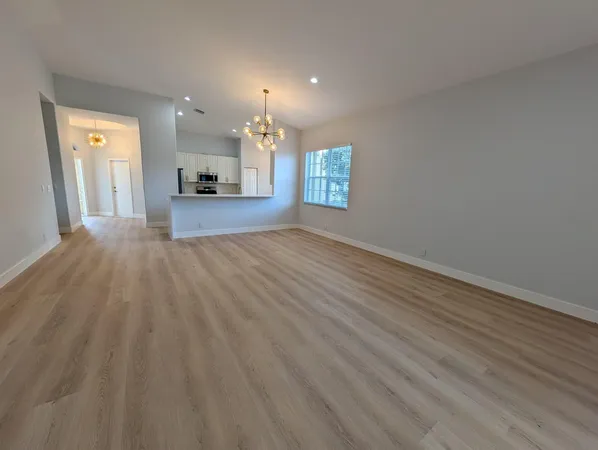 en empty room with windows