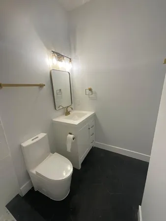 an empty room with a empty space and windows