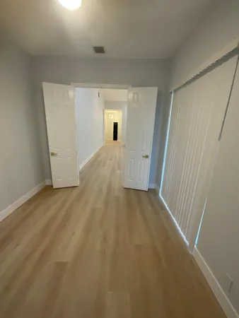 a bathroom with a sink and shower