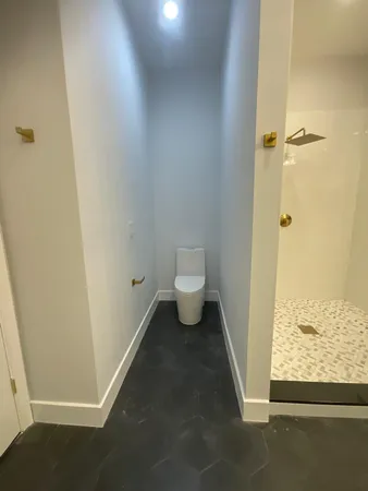 a bathroom with a double vanity sink and mirror